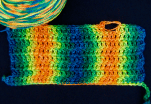 Rows of double crochets keep each color of a variegated yarn stacked in columns