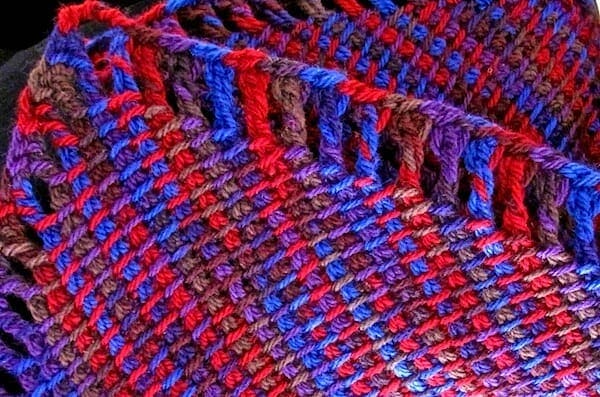 A diagonal corner of the Four Peaks scarf.