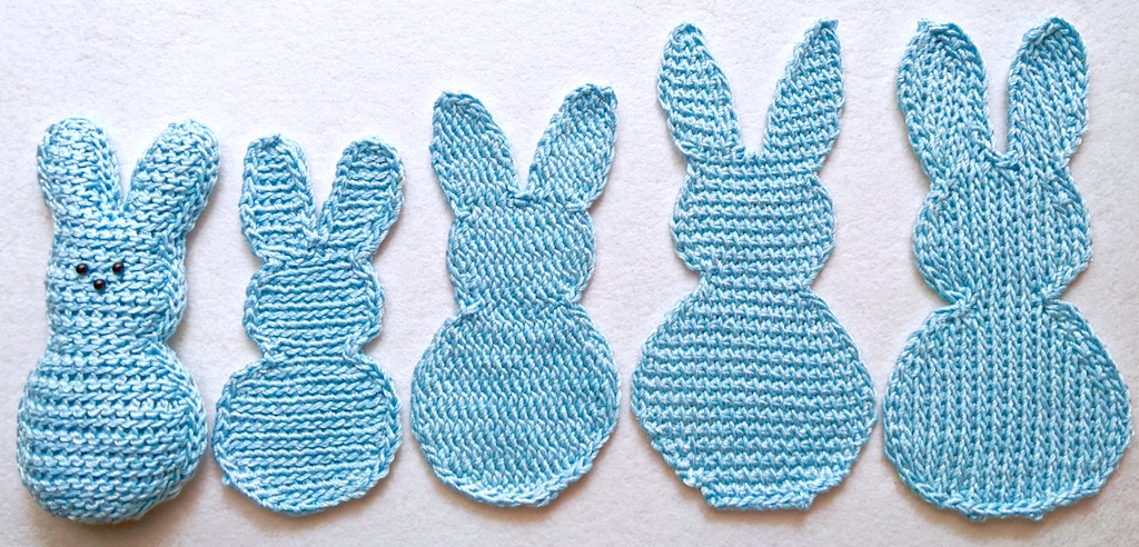 Five marshmallow-candy-shape bunnies lined up from shortest (3 slip stitch) to tallest (2 Tunisian crochet)