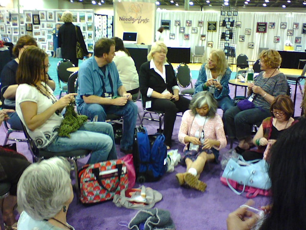60s-style Crochet-In at 2007 TNNA industry show from front left around: Gwen Blakley Kinsler, Amy (yarn shop staff), Drew Emborsky, Candi Jensen, Doris Chan, Marty Miller, Jane Schwartz, Sheryl Means (Texas yarn shop owner)