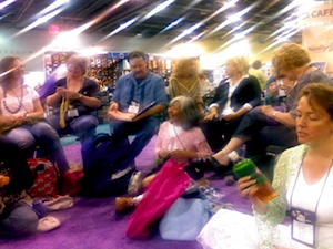 Kim Werker's photo of crochet designers & publishers during 60s-style crochet-in protest at 2007 TNNA show
