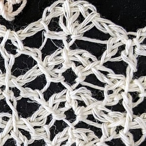 Crisp close up of linen blend lace swatch